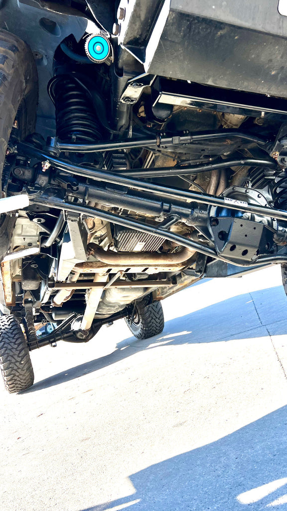 Installed underside view of steering system on lifted Dodge Ram