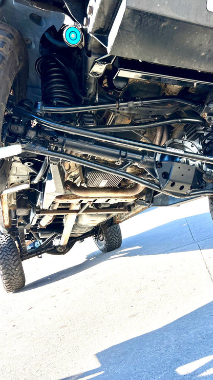 Installed underside view of steering system on lifted Dodge Ram